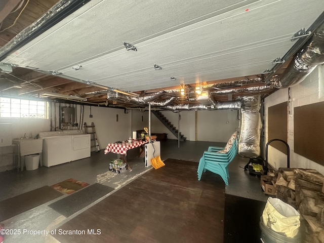 105 Hughes Dr, Greene Twp, PA 18426 - basement featuring washing machine and clothes dryer and stairway