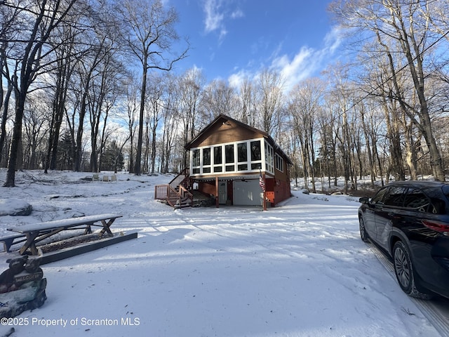 105 Hughes Dr, Greene Twp, PA 18426 - view of front of home featuring a sunroom and stairs