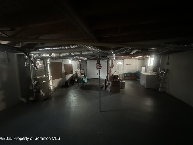 105 Hughes Dr, Greene Twp, PA 18426 - unfinished basement with washer / clothes dryer and heating unit