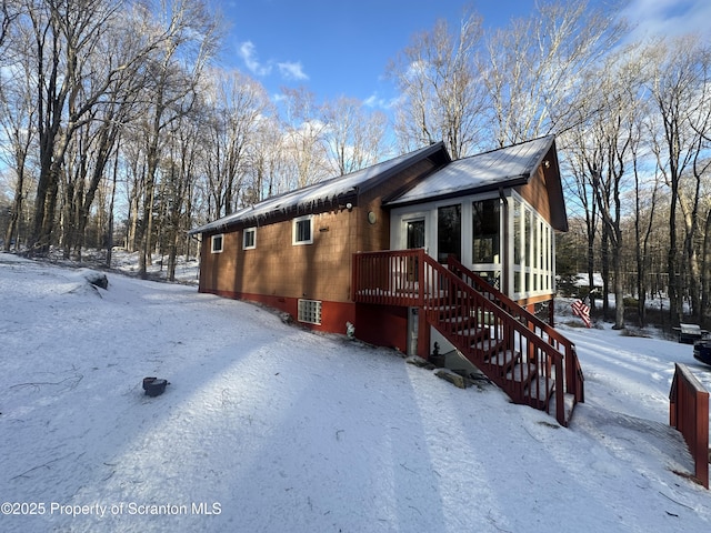 105 Hughes Dr, Greene Twp, PA 18426 - view of front of property with a sunroom and stairs