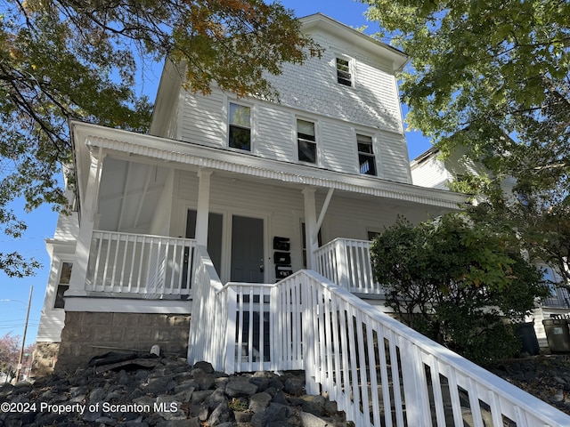 view of front facade featuring covered porch