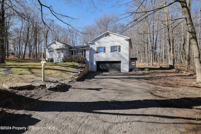 view of property exterior featuring a garage