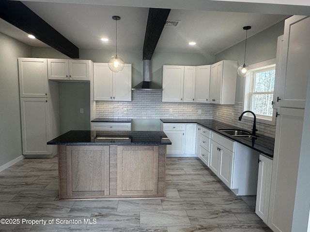 13692 State Route 374, Union Dale, PA 18470 - kitchen with tasteful backsplash, wall chimney exhaust hood, a sink, dark countertops, and beamed ceiling