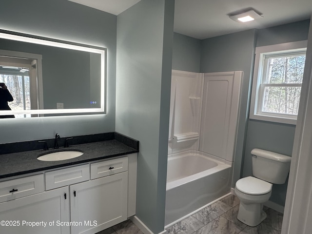 13692 State Route 374, Union Dale, PA 18470 - full bath with marble finish floor, vanity, baseboards, and toilet