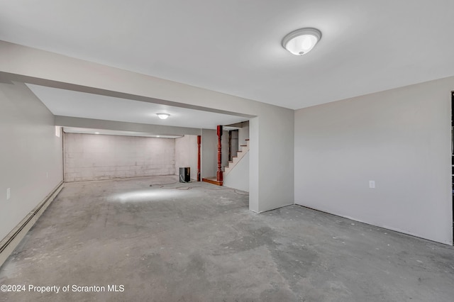 basement featuring a baseboard radiator