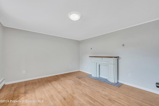 unfurnished living room featuring light hardwood / wood-style flooring