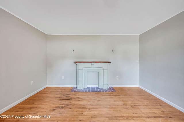 unfurnished living room featuring light hardwood / wood-style flooring