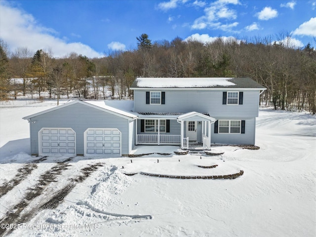 view of front of house featuring a garage and covered porch