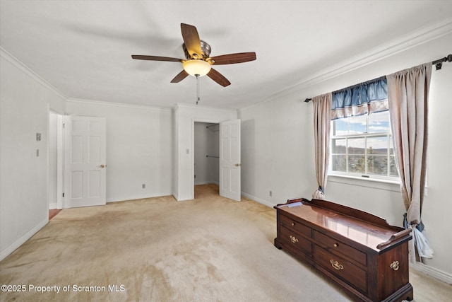 bedroom with baseboards, ornamental molding, a ceiling fan, and light colored carpet