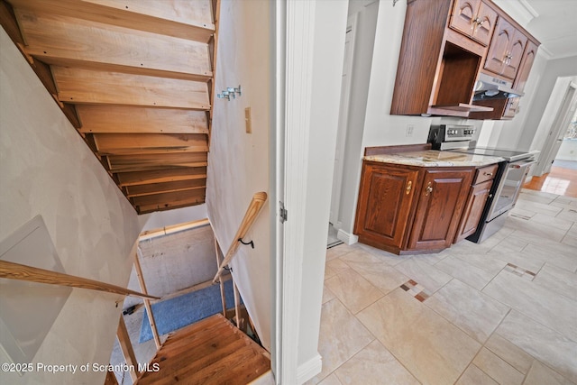 interior space with crown molding and vanity