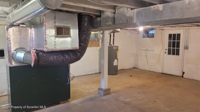 basement featuring electric water heater