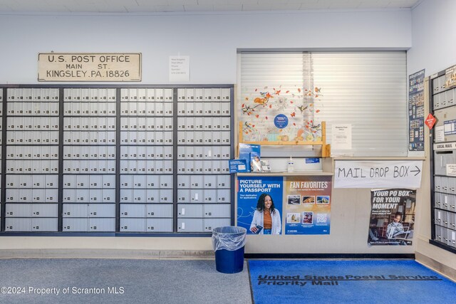 view of community with a mail area