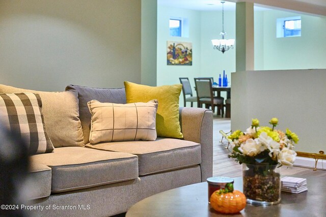 living room featuring a chandelier