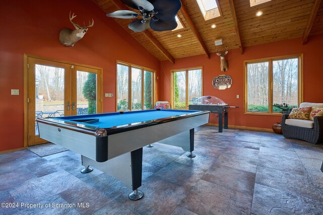 game room featuring a skylight, wood ceiling, ceiling fan, beamed ceiling, and pool table