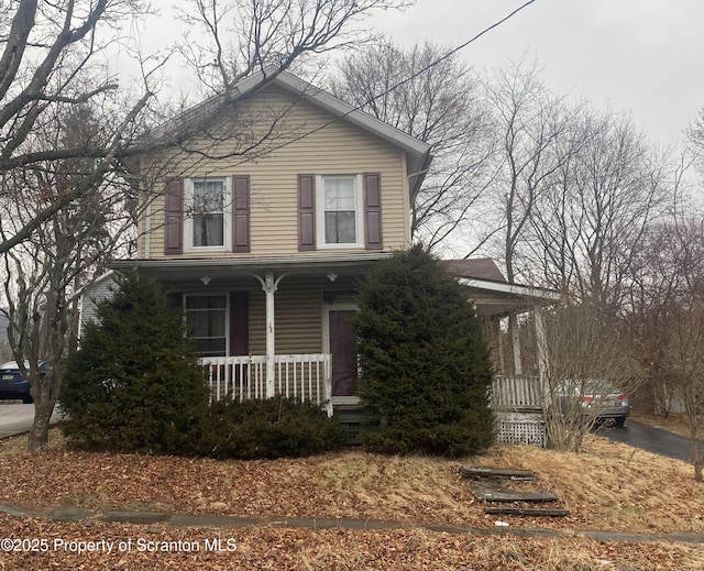 view of front property featuring a porch