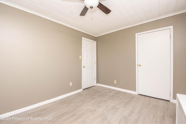 unfurnished room featuring crown molding, ceiling fan, and light wood-type flooring