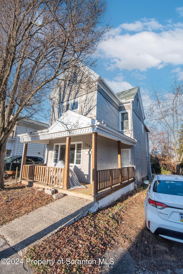 exterior space featuring covered porch