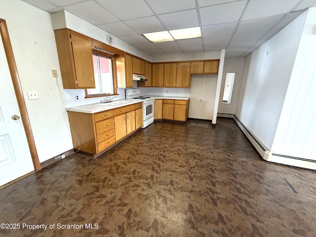 kitchen featuring a paneled ceiling, white range with electric cooktop, and sink