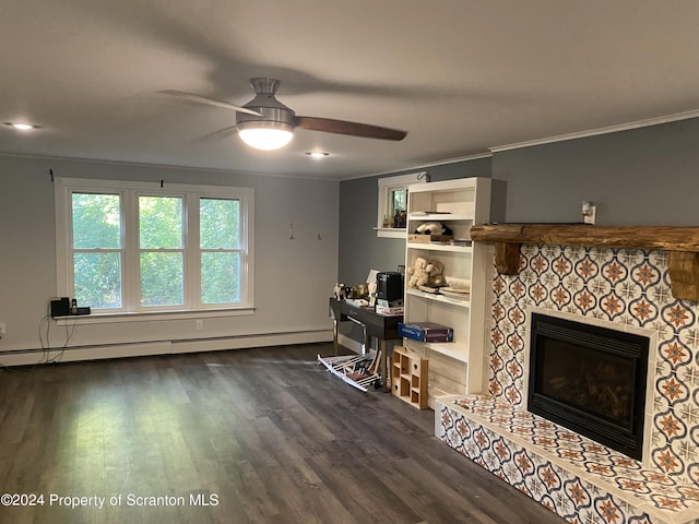 living room with dark hardwood / wood-style floors, ceiling fan, ornamental molding, and a baseboard heating unit