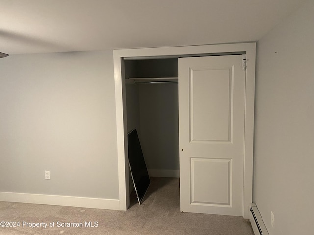 closet featuring baseboard heating