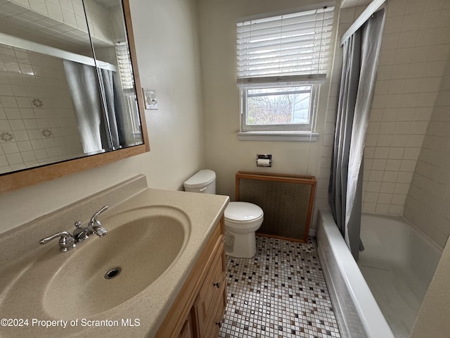 full bathroom featuring vanity, tile patterned flooring, toilet, shower / tub combo with curtain, and radiator heating unit