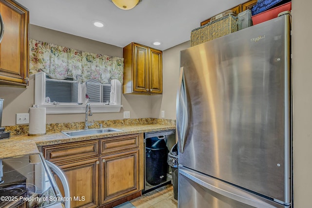 132 6th St, Blakely, PA 18447 - kitchen with freestanding refrigerator, electric stove, dishwasher, brown cabinets, and light countertops