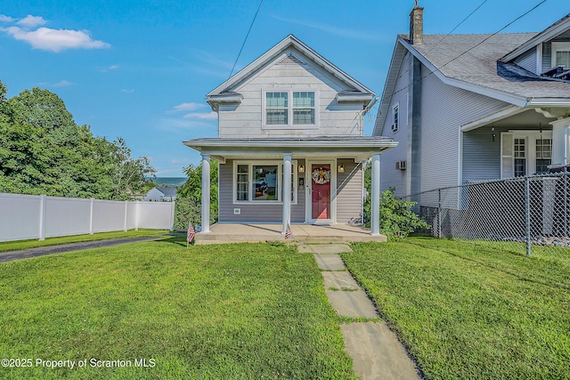 132 6th St, Blakely, PA 18447 - view of front facade with covered porch and a chimney