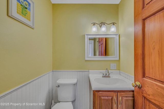 132 6th St, Blakely, PA 18447 - bathroom featuring a wainscoted wall and vanity