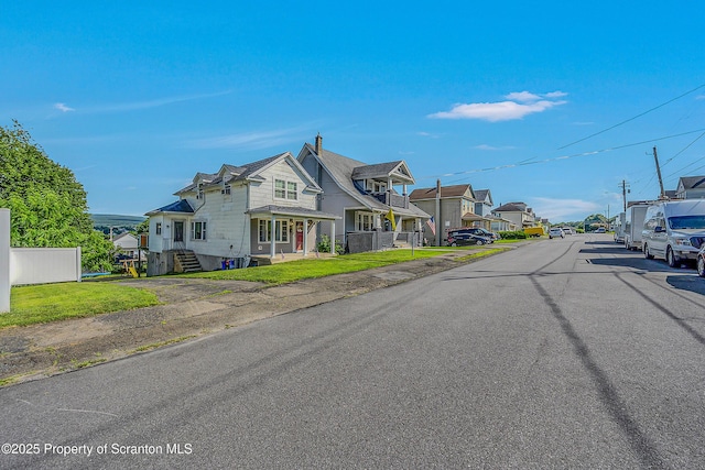 132 6th St, Blakely, PA 18447 - view of asphalt street with a residential view and sidewalks