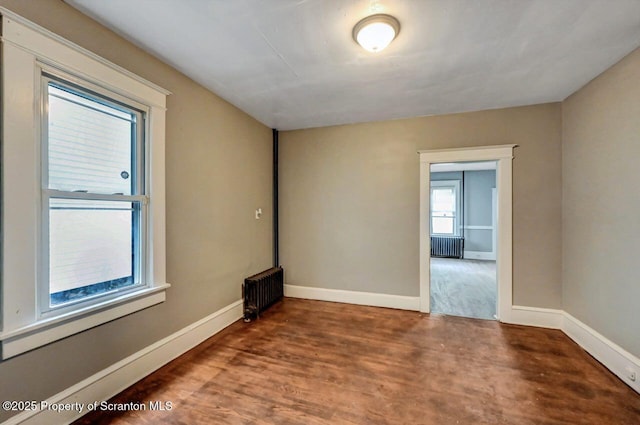 1014 Jackson St 1012, Scranton, PA 18504 - empty room featuring radiator and wood finished floors