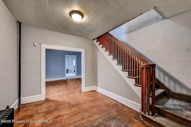 1014 Jackson St 1012, Scranton, PA 18504 - stairway with wood finished floors and baseboards