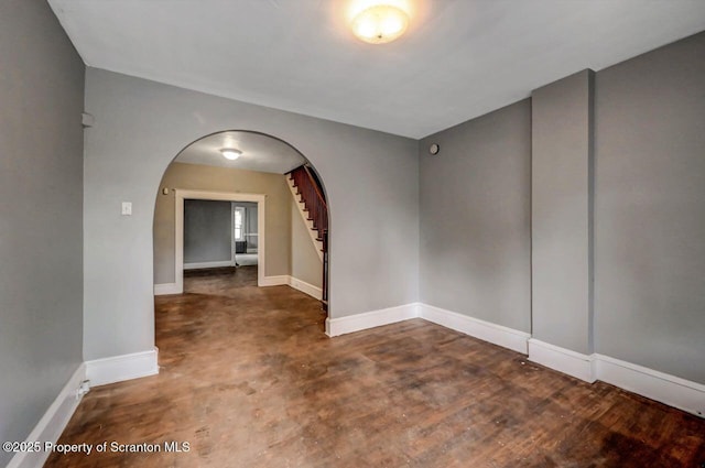 1014 Jackson St 1012, Scranton, PA 18504 - empty room featuring arched walkways and stairway