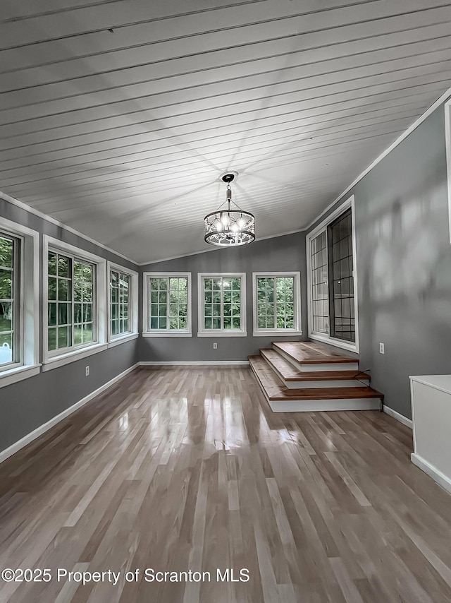 1446 Main St, Friendsville, PA 18818 - unfurnished sunroom featuring a chandelier and lofted ceiling