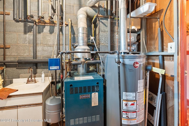 utility room featuring sink and gas water heater