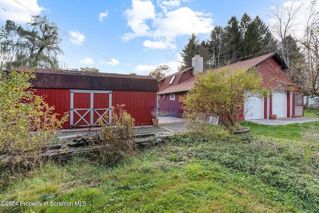 exterior space featuring a garage