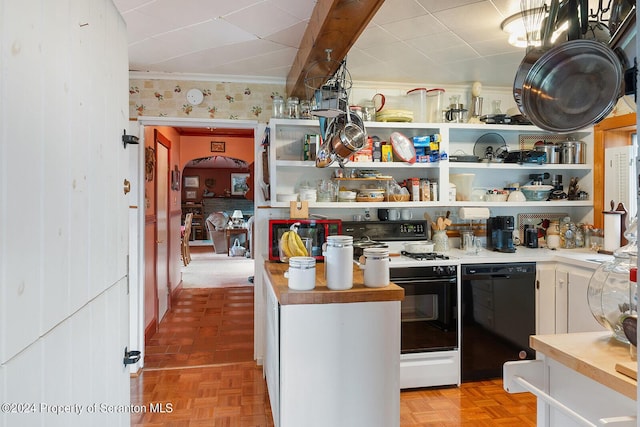 kitchen featuring white cabinets, parquet floors, white range oven, dishwasher, and butcher block counters