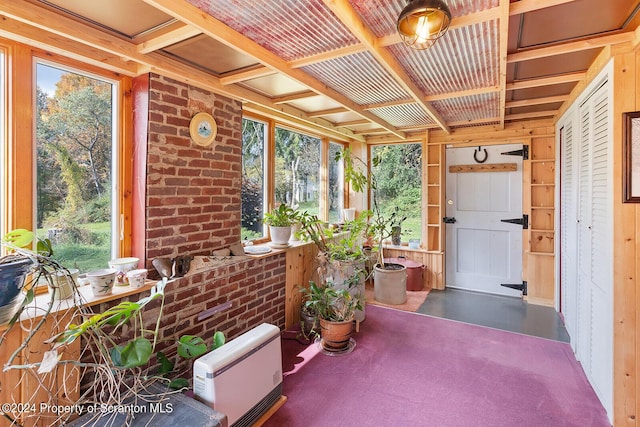 sunroom / solarium with heating unit and plenty of natural light