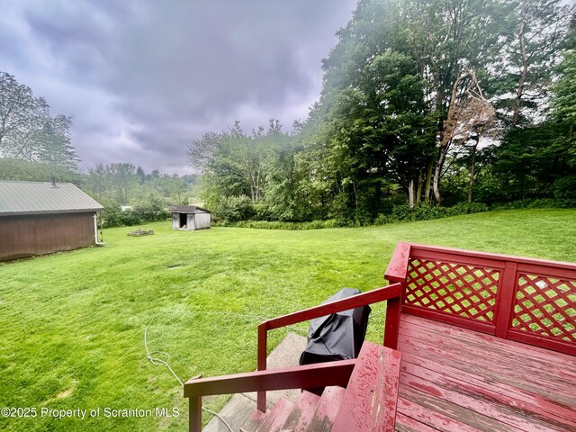13 Mundro Rd, Scott Twp, PA 18447 - view of grassy yard with a storage unit