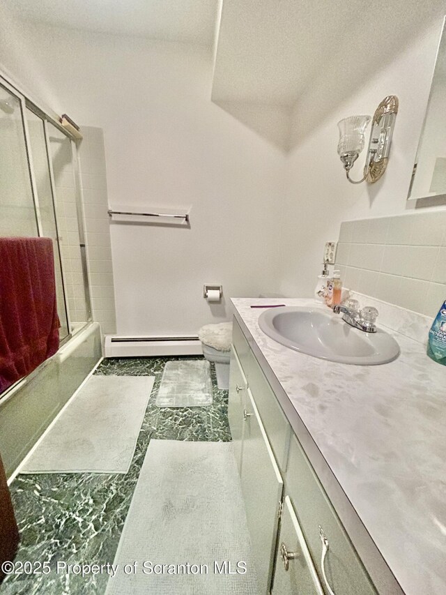 13 Mundro Rd, Scott Twp, PA 18447 - bathroom featuring baseboard heating, vanity, shower / bath combination with glass door, and marble finish floors