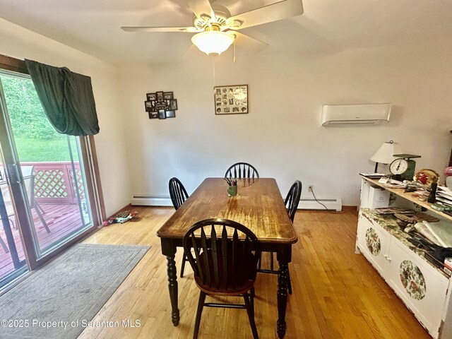 13 Mundro Rd, Scott Twp, PA 18447 - dining room with a baseboard heating unit, baseboard heating, light wood-style flooring, a ceiling fan, and an AC wall unit