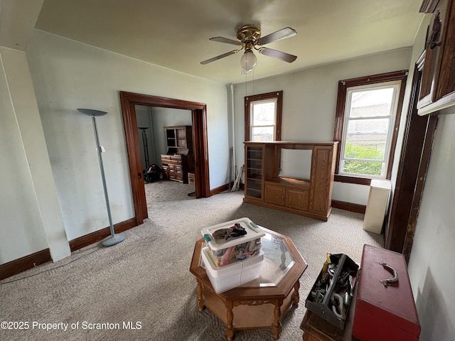 210 School St, Scranton, PA 18508 - living room featuring a ceiling fan, baseboards, and carpet flooring