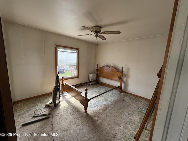 210 School St, Scranton, PA 18508 - unfurnished bedroom with radiator, carpet flooring, baseboards, and a ceiling fan