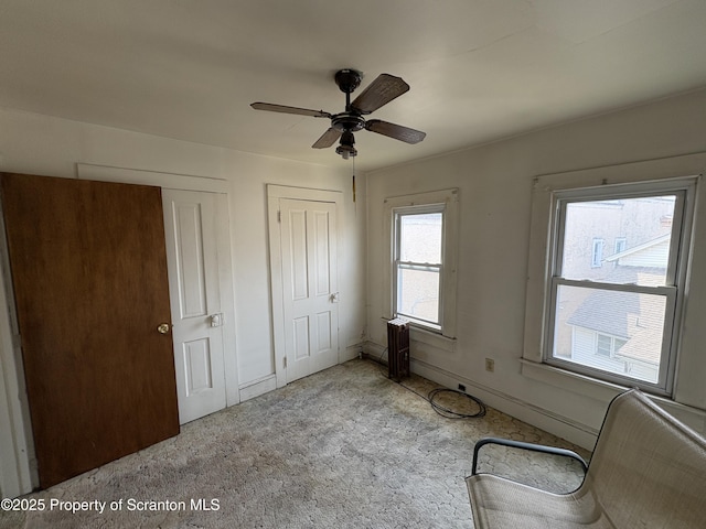 210 School St, Scranton, PA 18508 - unfurnished bedroom featuring two closets, carpet, and ceiling fan