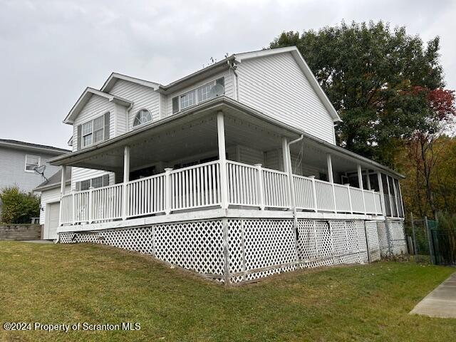 view of home's exterior featuring a lawn