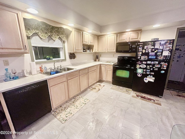 kitchen featuring sink, black appliances, and light brown cabinets