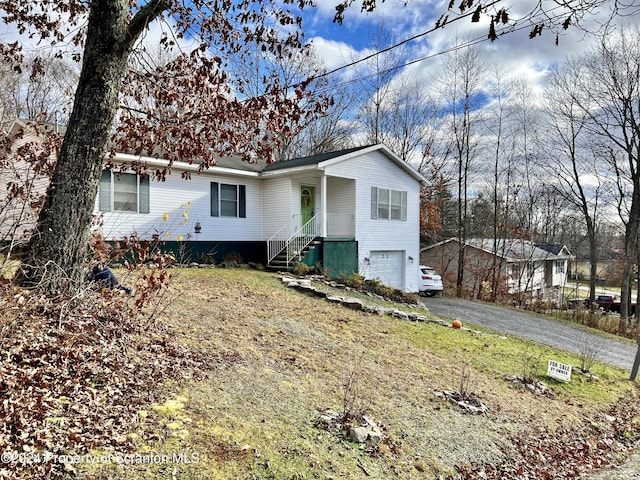 view of front of property featuring a garage