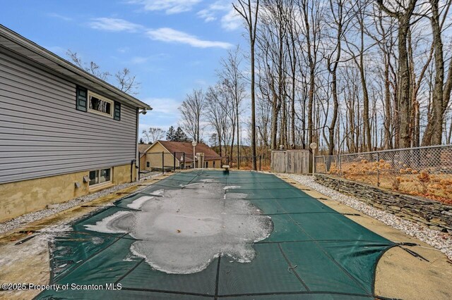 view of pool featuring fence and a fenced in pool