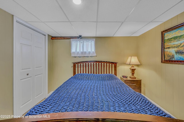 bedroom with a drop ceiling