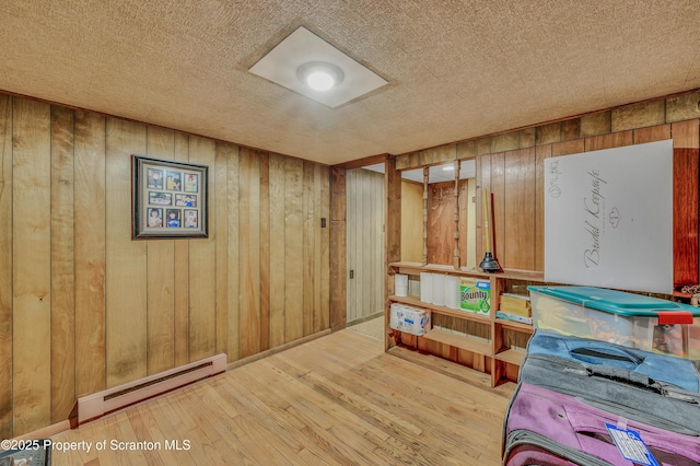 storage area with a baseboard radiator