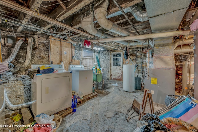 basement with washer and dryer and gas water heater